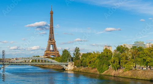 Eiffel Tower by seine river in autumn season in Paris. France