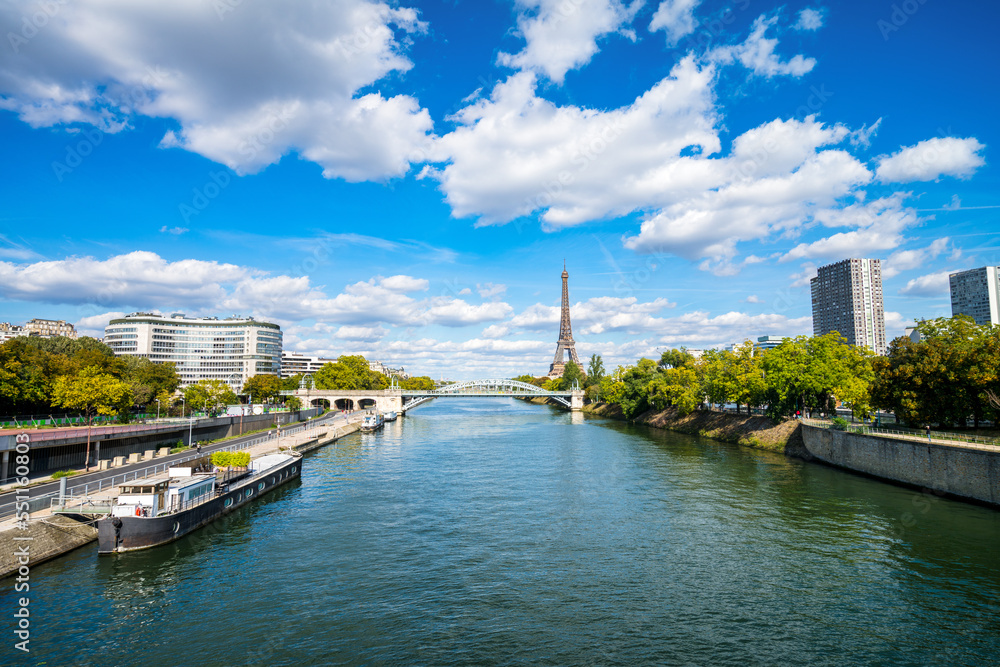 Seine river and skyline view of Paris with Eiffel Tower in the background. France