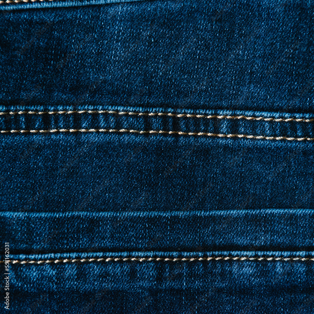 Denim background with copy space. Blue denim texture, square format Denim background with copy space. Blue denim texture, square format