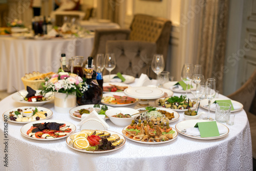 Server table with different food in the restaurant