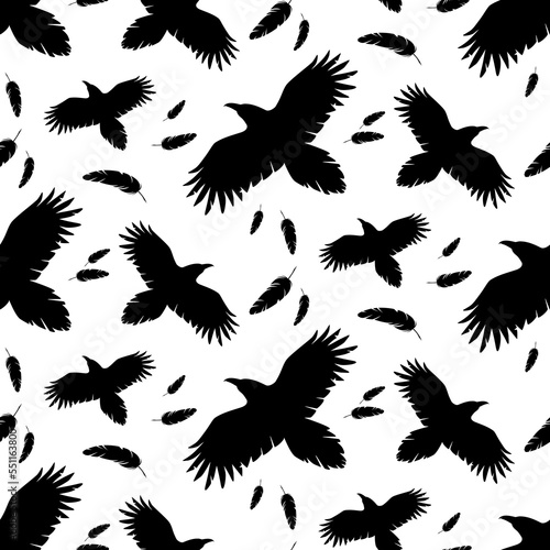 Silhouettes of flying ravens and falling feathers. Black and white seamless pattern. Best for textile  wallpapers  wrapping paper  package and decoration.