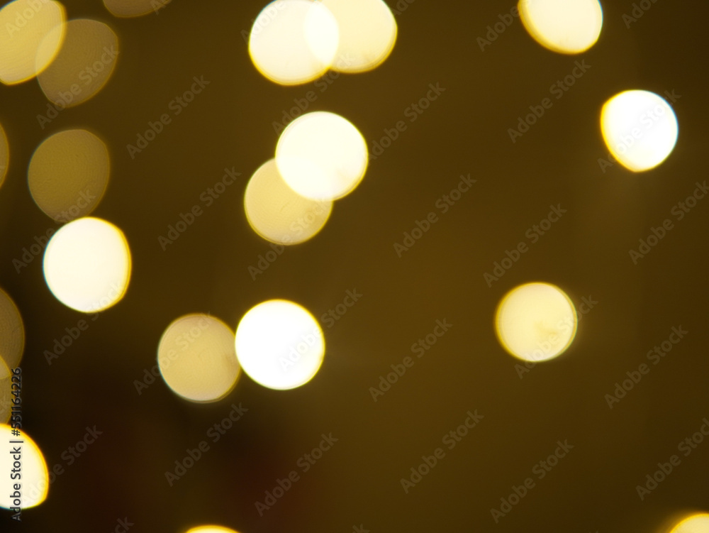 Golden and dark brown round bokeh lights festive background Golden and dark brown round bokeh lights festive background