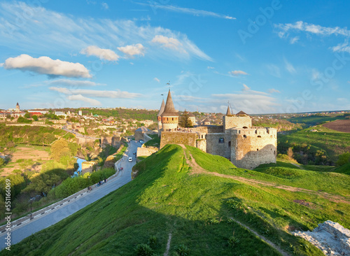 Kamianets-Podilskyi Castle (Khmelnytskyi Oblast, Ukraine) is former Polish castle that is one of the Seven Wonders of Ukraine. Built in early 14th century. All peoples and cars is unrecognizable.