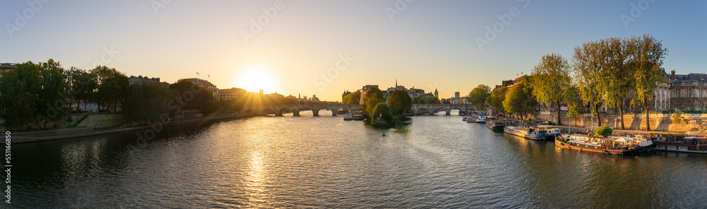 Fototapeta premium Sunrise panorama over Paris seine river and Pont Neuf. France