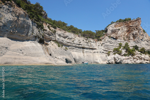 Travel in Turkey Aegean sea and rocks island landscape nature destinations beautiful scenic view resort summer season. Big rocked shores over the deep blue sea water. Luxury places for chillout photo