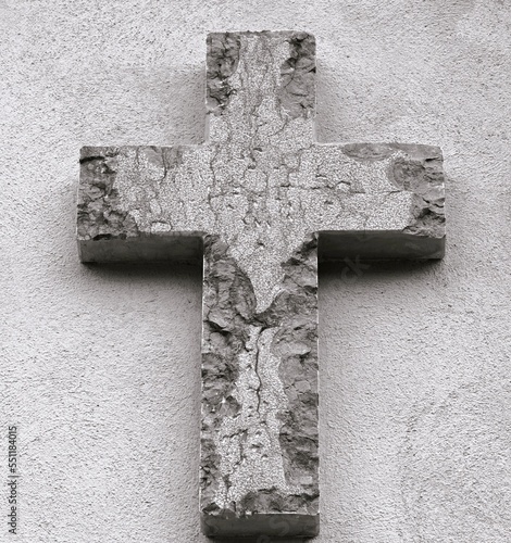 Christian cross, black-and-white background.  Symbolic easter crucifixion, resurrection hope concept.