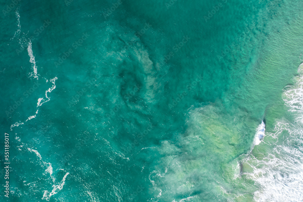 Aerial view of a water whirlpool in an ocean