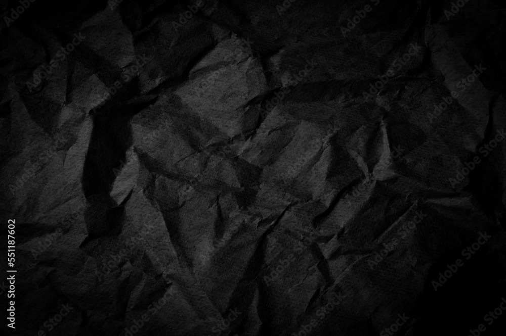 Fototapeta premium dark paper texture. minimalist and elegant crumple paper. simple dark background
