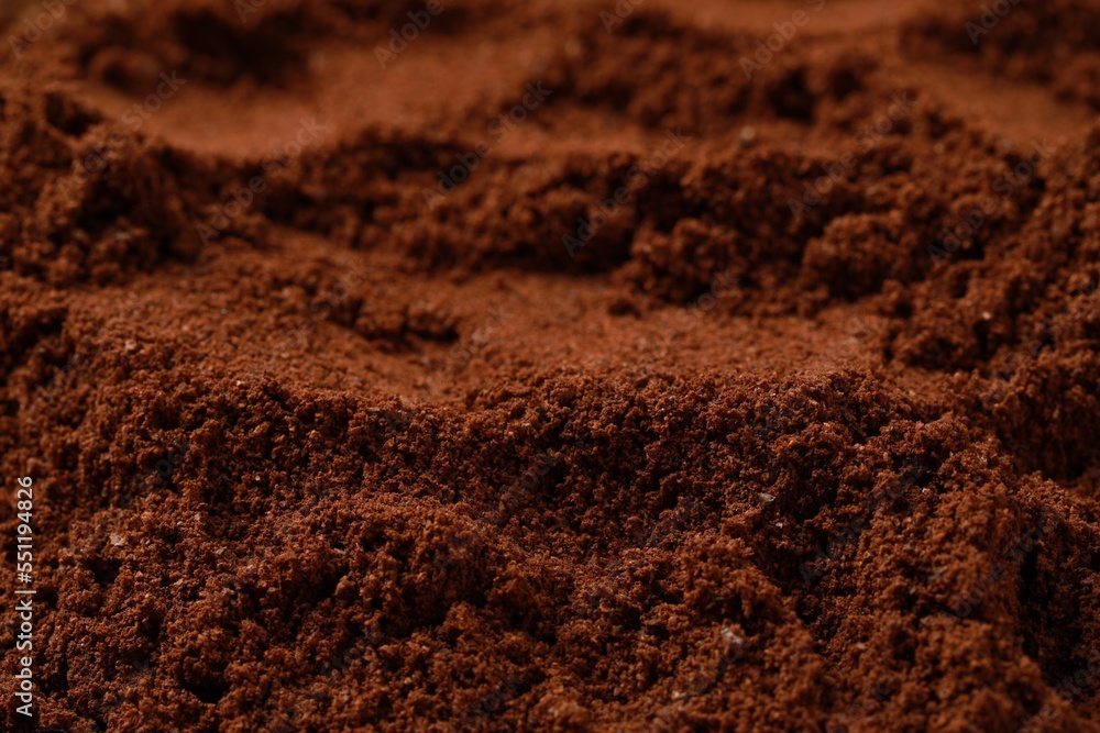 Dry ground coffee as background, closeup view Dry ground coffee as background, closeup view