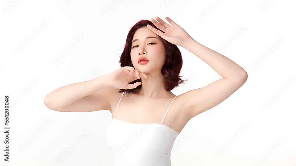 Beautiful Young Asian woman lifting hands up to show off clean and hygienic armpits or underarms on white background, Smooth armpit cleanliness and protection concept Beautiful Young Asian woman lifting hands up to show off clean and hygienic armpits or underarms on white background, Smooth armpit cleanliness and protection concept