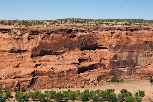Cliff dwellings, Canyon de Chelle, Arizona. Green trees are on the mesa and canyon floor.