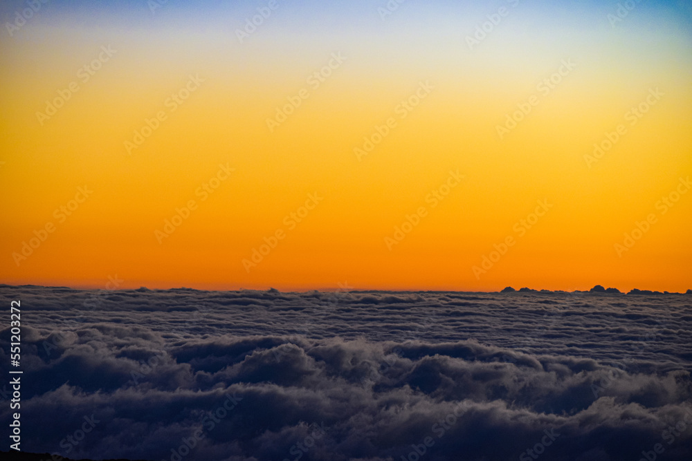 sunset in the sea of clouds mauna kea view