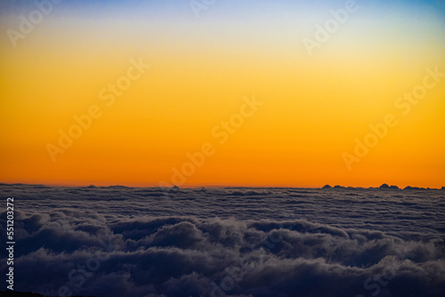 sunset in the sea of clouds mauna kea view