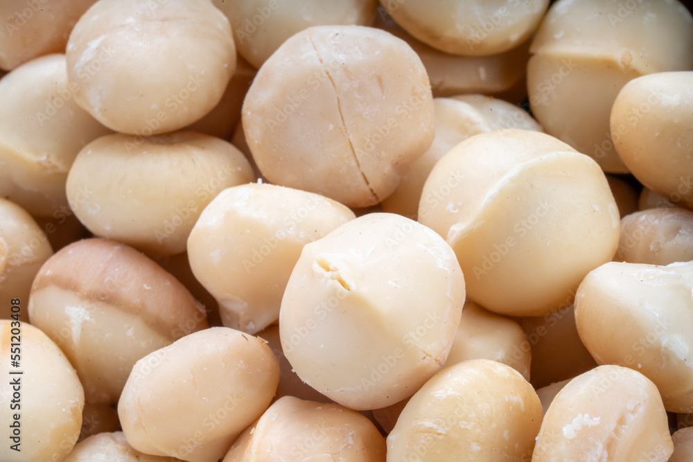 Close up, Macadamia nuts on wooden background. Close up, Macadamia nuts on wooden background.