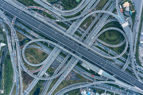 Canvas Print Multilevel junction motorway top view, Road traffic an important infrastructure in Thailand