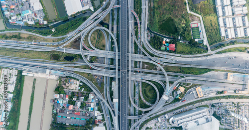 Multilevel junction motorway top view, Road traffic an important infrastructure in Thailand.Expressway Road and Roundabout.Transportation and travel concept.