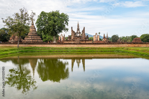 Scenery view of Wat Mahathat temple the most important and impressive temple compound in Sukhothai Historical Park in Sukhothai province of Thailand.