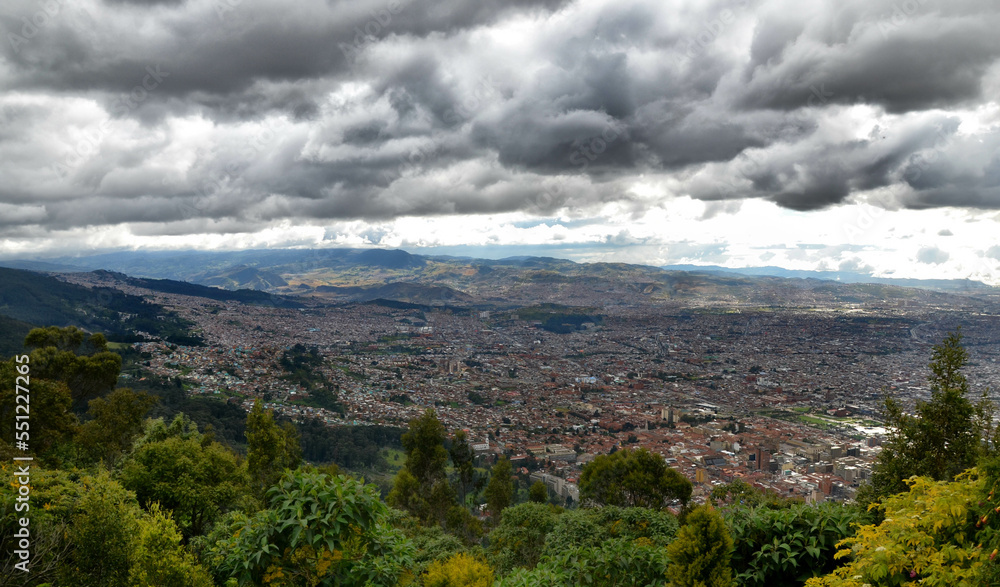 colombian cloudy cityscape view from the mountains 