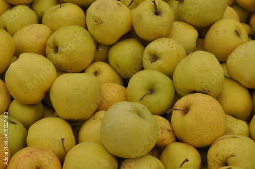 yellow apples in a market
