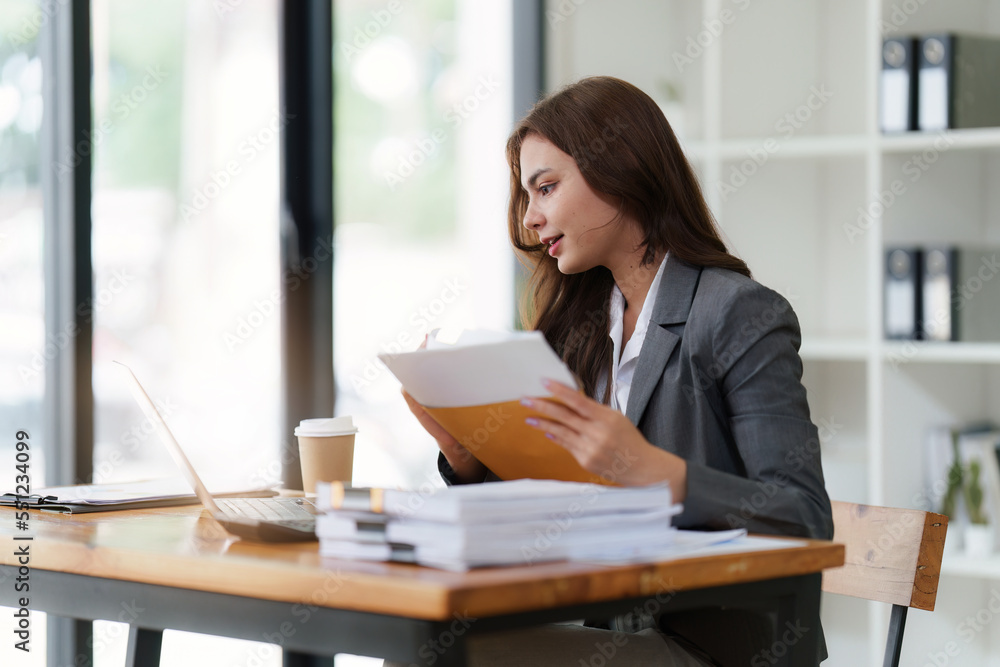 Administrator business people financial inspector making report calculating balance. Internal Revenue and Accounting concept Administrator business people financial inspector making report calculating balance. Internal Revenue and Accounting concept