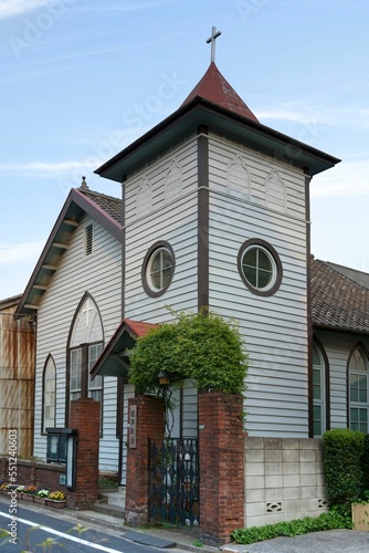 Timber architecture of the Christian Nezu Church adorned with a cross in the Bunkyo district photo