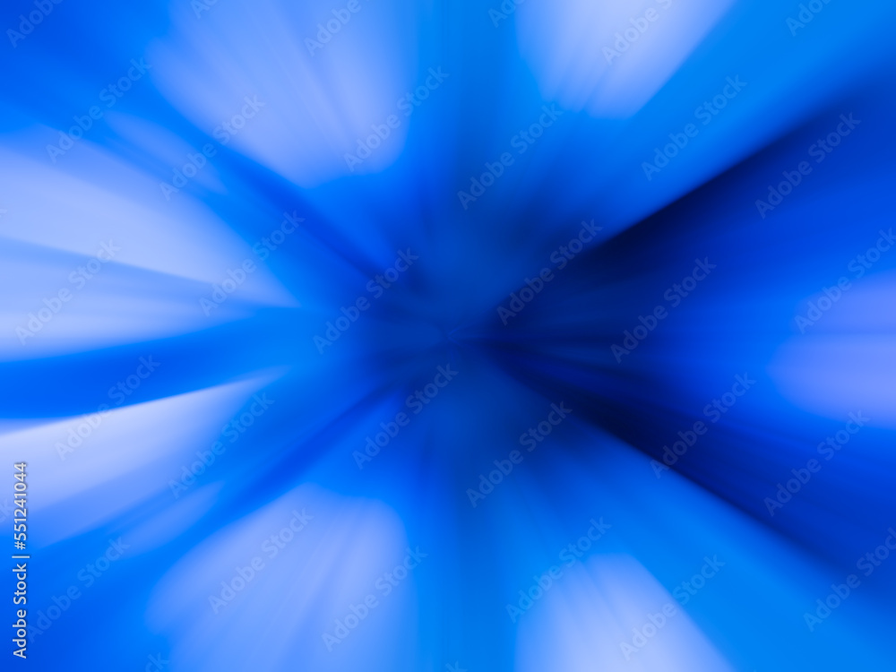 Blue, colorful, bright speed lines. Motion blur background graphic style. The light speeds from the center of the image and radiates to the side. Blue, colorful, bright speed lines. Motion blur background graphic style. The light speeds from the center of the image and radiates to the side.