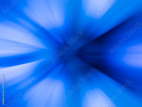 Blue, colorful, bright speed lines. Motion blur background graphic style. The light speeds from the center of the image and radiates to the side.