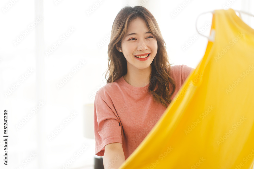 Portrait of young adult southeast asian dyed hair woman with yellow shirt Portrait of young adult southeast asian dyed hair woman with yellow shirt