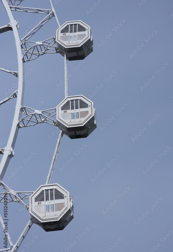 Low Angle View Of Ferris Wheel Against Sky in Barcelona, Spain Low Angle View Of Ferris Wheel Against Sky in Barcelona, Spain