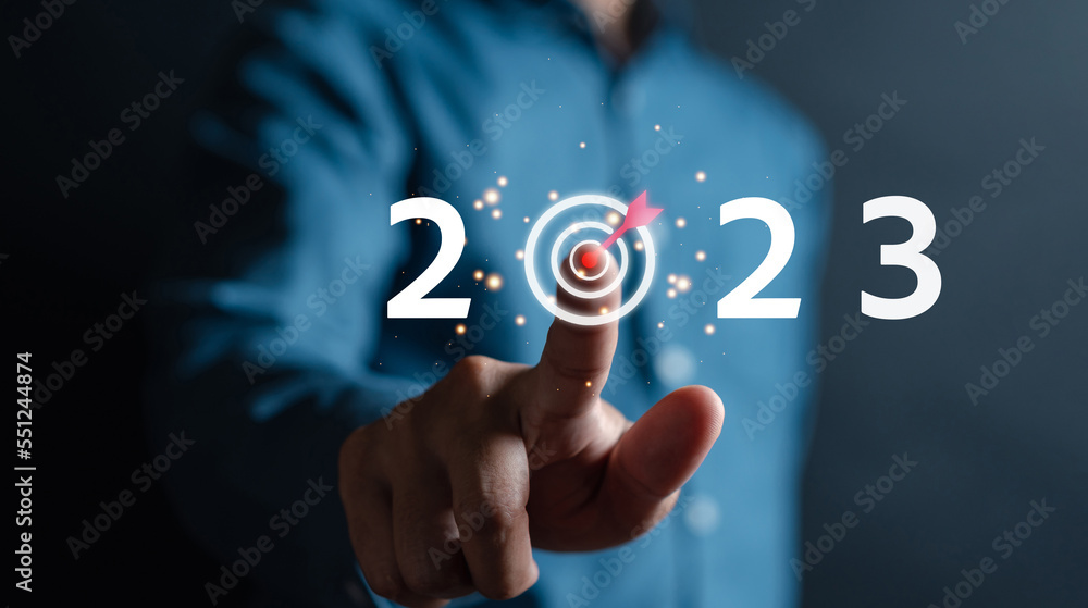 Businessman aiming 2023 new year business target planning development leadership and customer target group, investment growth and success development, achievement, goal, strategy, finance concept. Businessman aiming 2023 new year business target planning development leadership and customer target group, investment growth and success development, achievement, goal, strategy, finance concept.