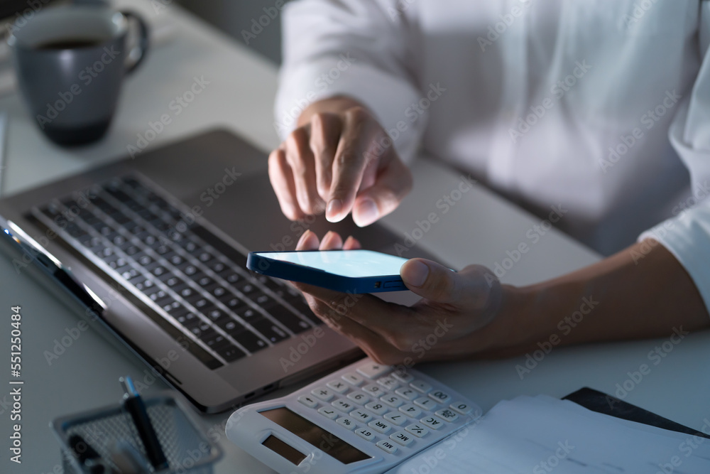 Business people holding Smartphone working mobile devices. cell telephone technology e-commerce concept Business people holding Smartphone working mobile devices. cell telephone technology e-commerce concept