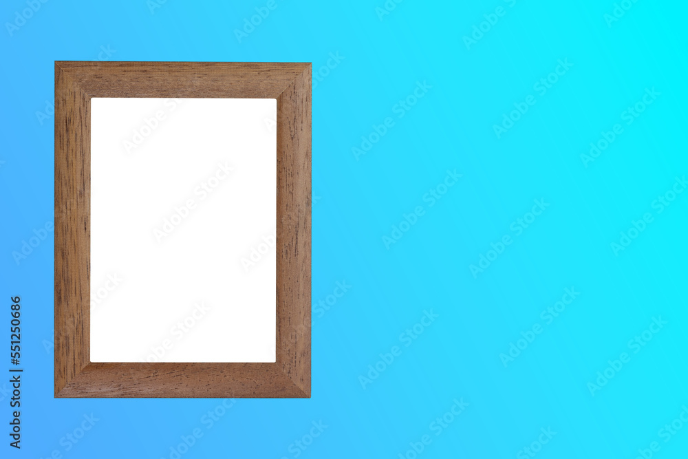 empty wooden picture frame with png transparent interior on light blue wall, panorama; empty wooden picture frame with png transparent interior on light blue wall, panorama;