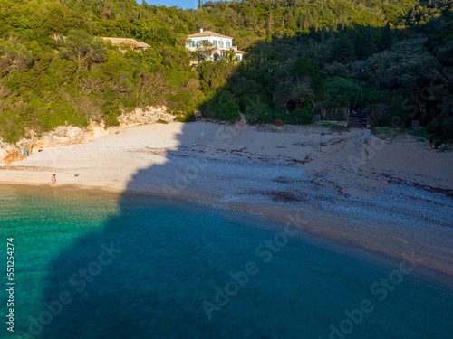 Aerial drone view of Rovinia Beach in liapades, Corfu, Greece photo