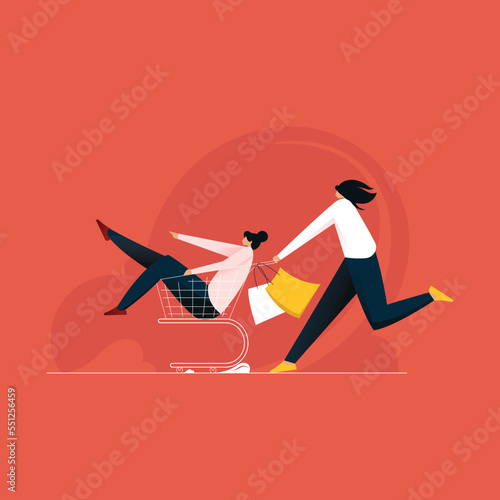 Cheerful women enjoying shopping, girls carrying shopping bags and running to get the latest offers at the shopping center