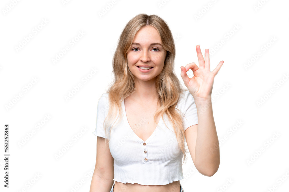 Young English woman over isolated background showing ok sign with fingers Young English woman over isolated background showing ok sign with fingers