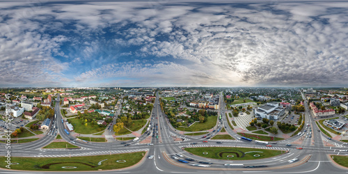 aerial full seamless spherical hdri 360 panorama view above road junction with traffic in equirectangular projection. May use like sky replacement for drone shots