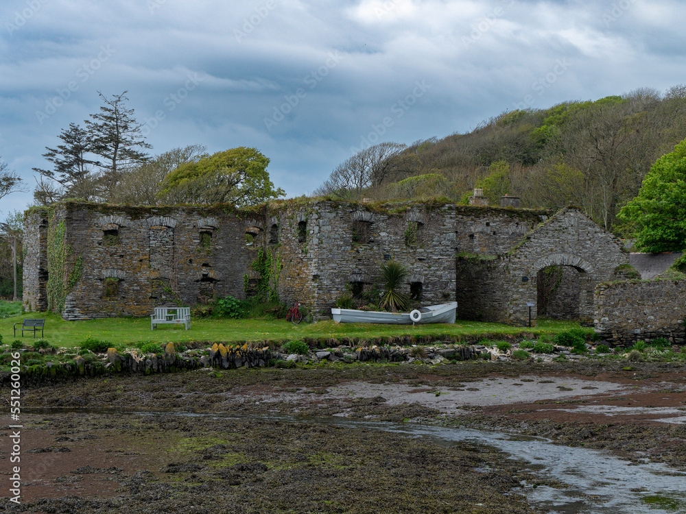 The ruins of Arundel grain store on the shore of Clonakilty Bay in the spring. An old stone building. Historical monument. Tourist attractions