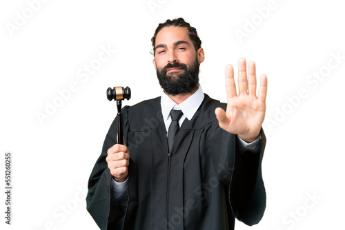 Judge caucasian man over isolated chroma key background making stop gesture