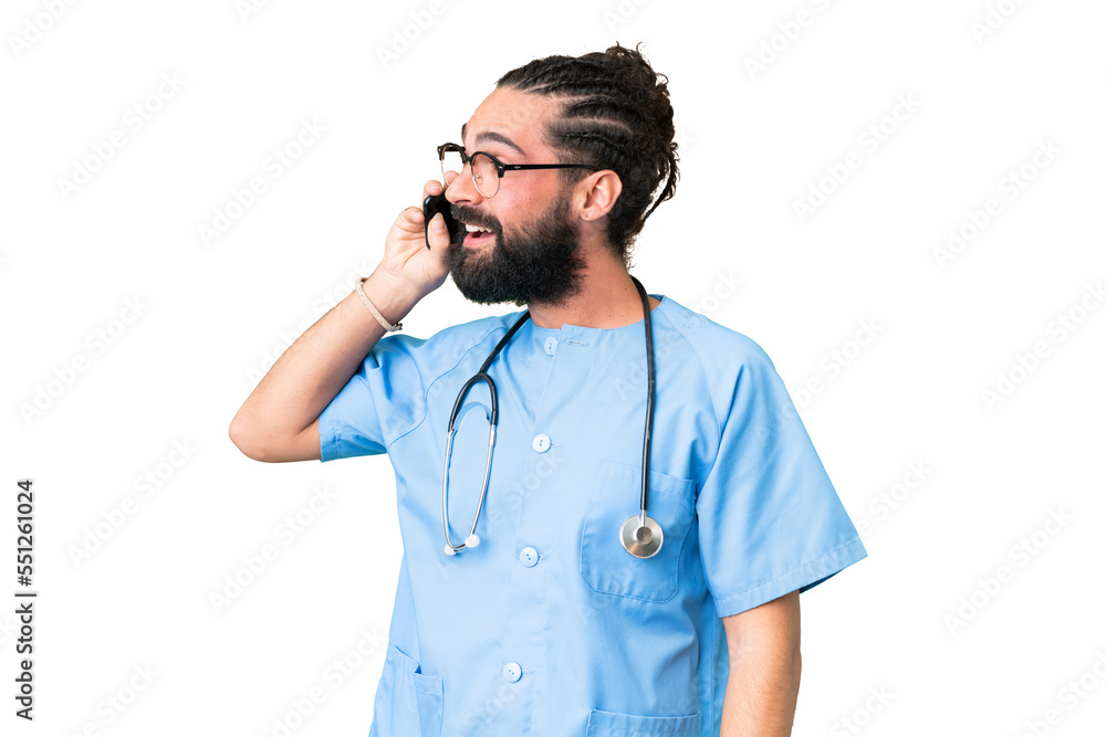 Young doctor man over isolated chroma key background keeping a conversation with the mobile phone with someone Young doctor man over isolated chroma key background keeping a conversation with the mobile phone with someone