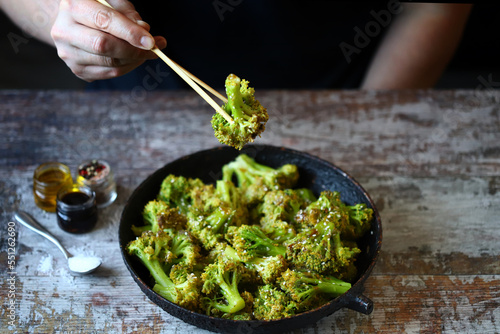 Broccoli baked with sweet and sour sauce. Healthy food.