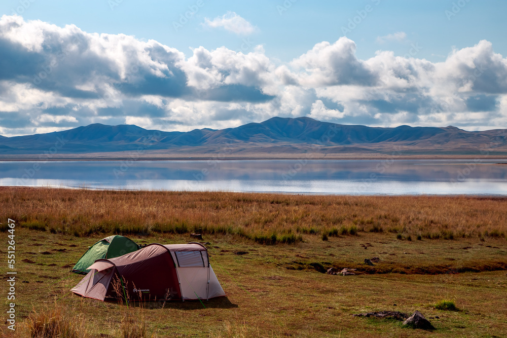 Tents on the shore of a beautiful salt lake