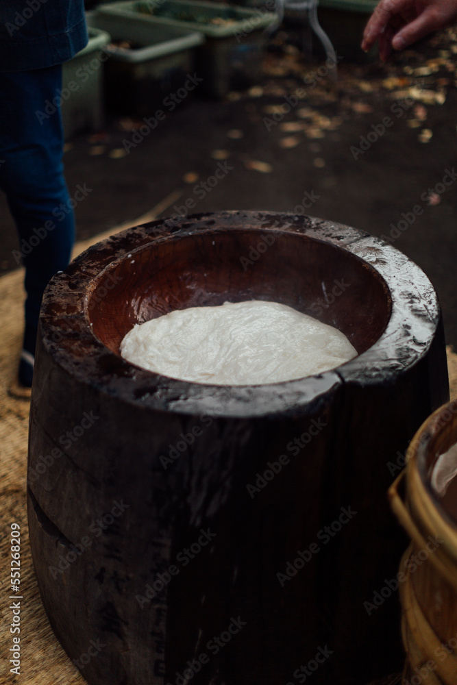 Rice in a large wooden usu (碓), or mortar ready to be pounded. Rice in a large wooden usu (碓), or mortar ready to be pounded.
