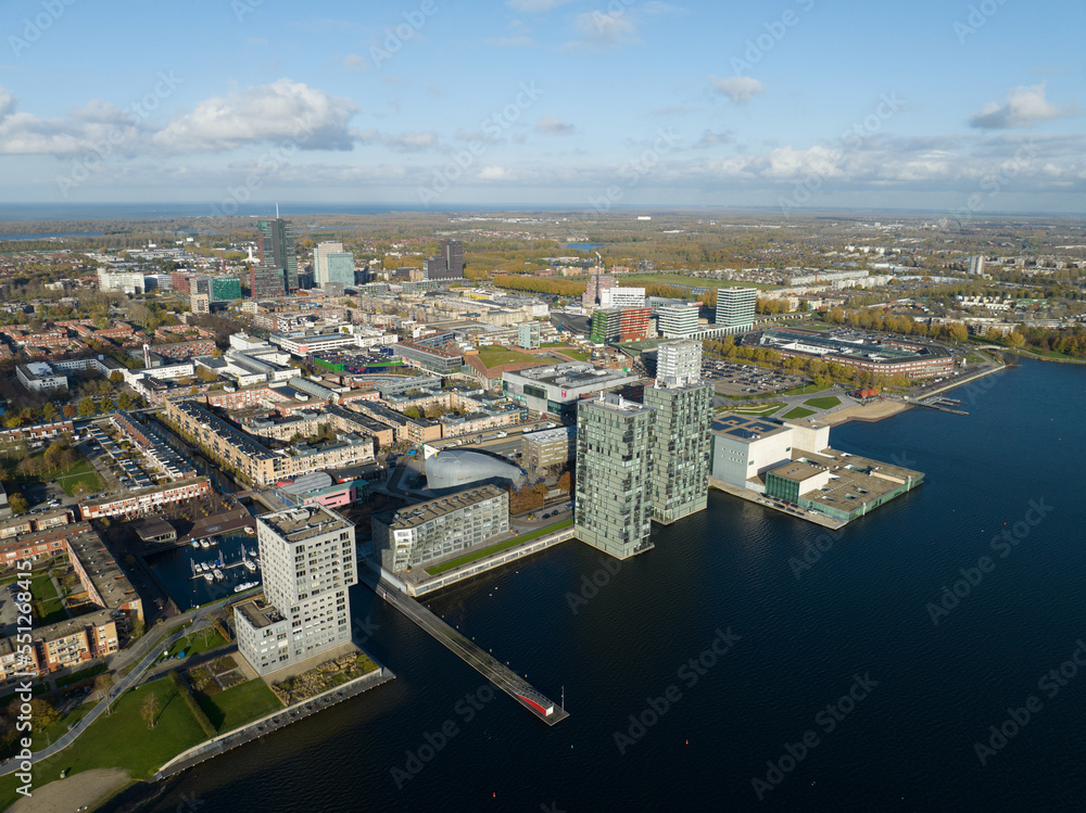 Almere medium large dutch city in province of Flevoland, The Netherlands, Skyline downtown city center, Almere Stad center, city build below sea level, Infrastructure and urban aerial view.