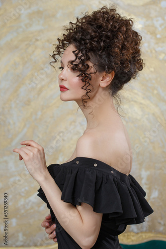 Portrait of a beautiful sexy woman with an elegant hairstyle.