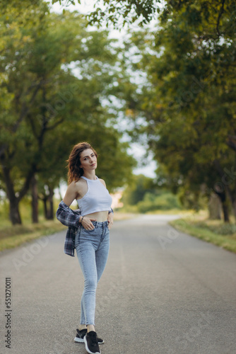 portrait of a beautiful girl on the road