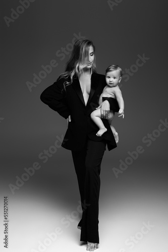 sexy mother with baby in her arms