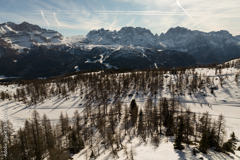 Aerial drone view of Madonna di Campiglio Trentino and ursus snowpark in Val Rendena dolomites Italy in winter