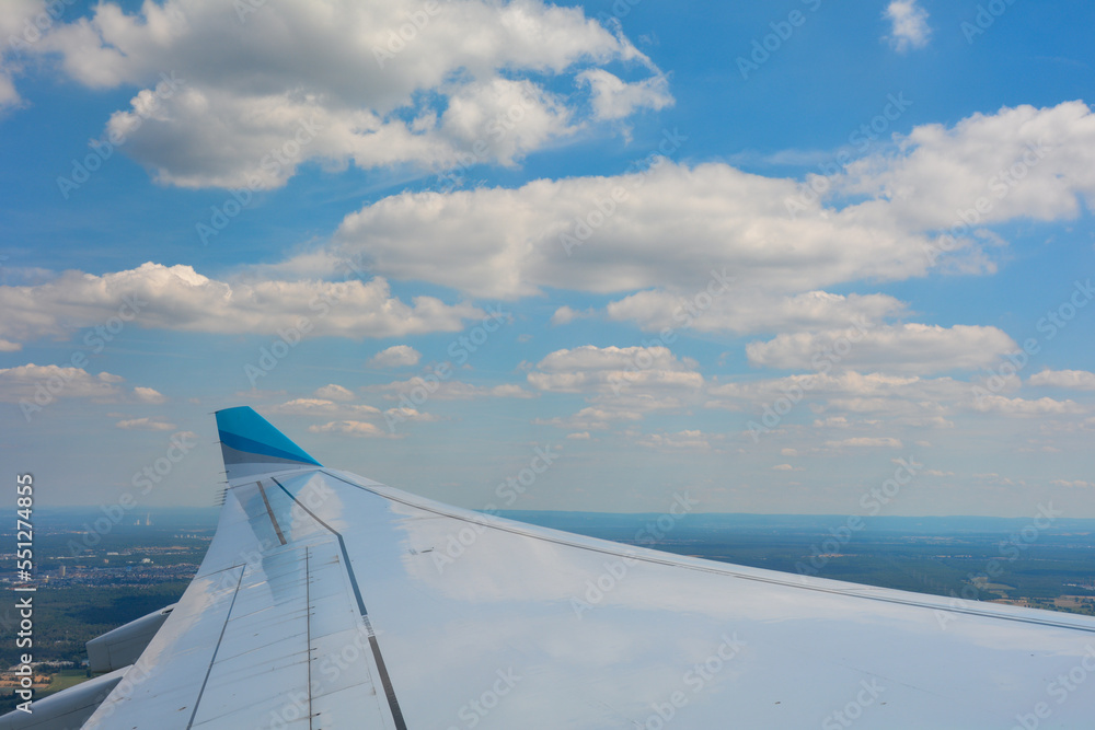 View from an aircraft window shortly after take-off with a view of the wing and landscape from the Frankfurt am Main area, Germany View from an aircraft window shortly after take-off with a view of the wing and landscape from the Frankfurt am Main area, Germany