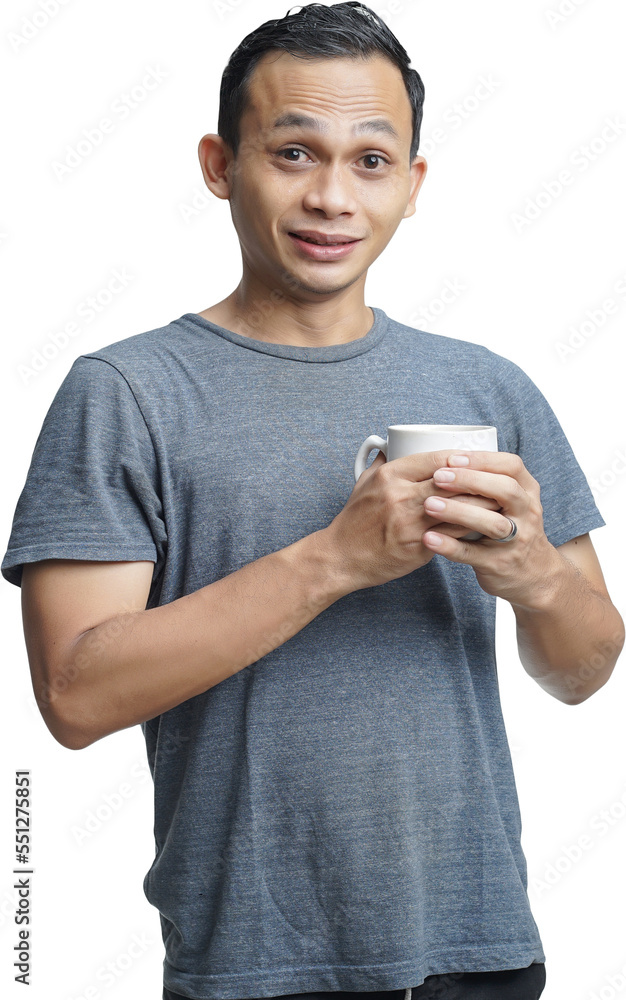 handsome asian man holding cup of coffee on isolated background handsome asian man holding cup of coffee on isolated background