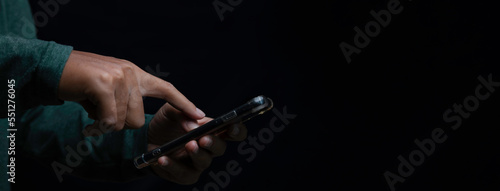 Young man using smartphone.
